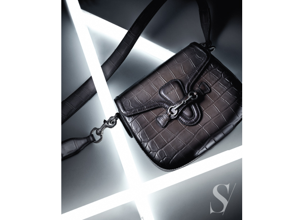 Handbag ($18,000) by Gucci. 