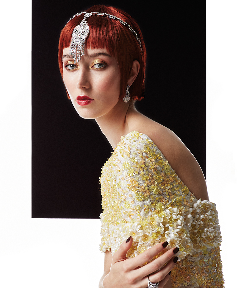 Gown, earrings and ring by Chanel; headpiece by Carole Tanenbaum. 