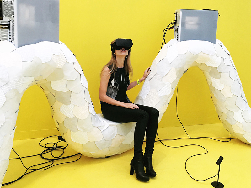 Soboleva, immersed in a Jon Rafman VR piece at Frieze London